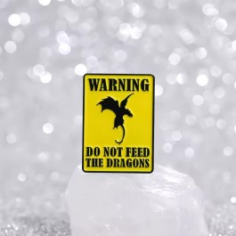 Odznak Do not feed the dragons | ???